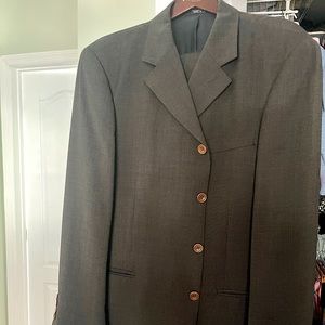 4 button brown suit . Made in Italy 100% wool